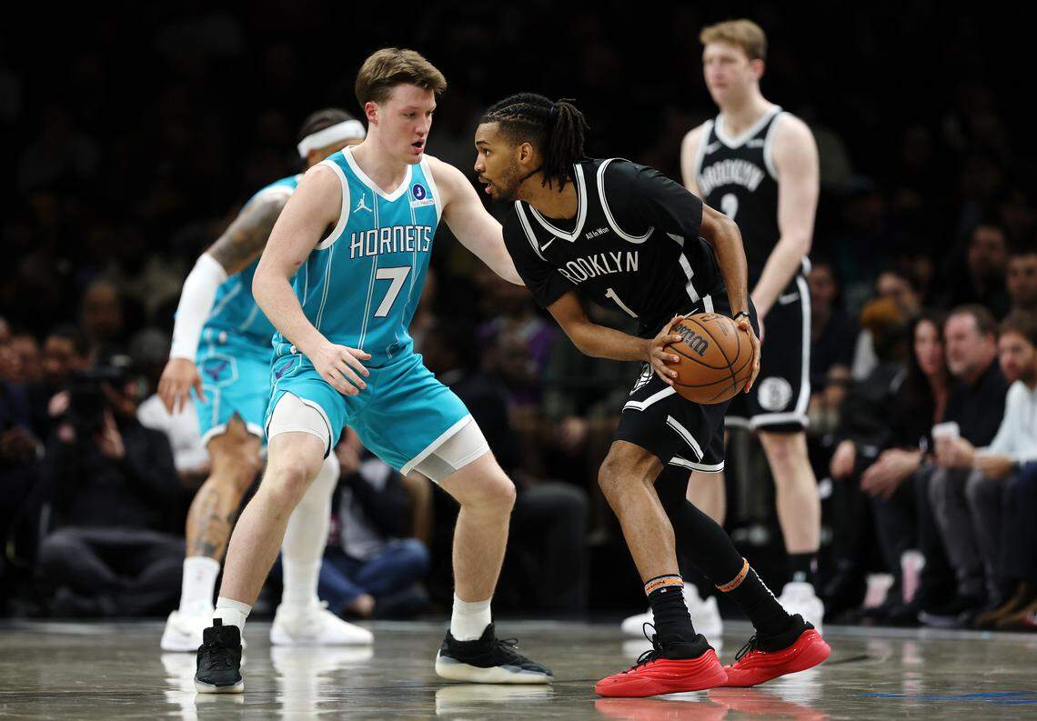Ziaire Williams of the Brooklyn Nets dribbles against Kon Knueppel of the Charlotte Hornets during Monday’s first half at Barclays Center.