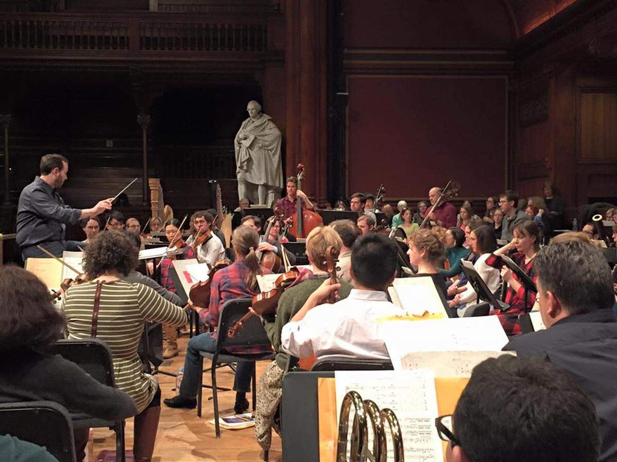 Scott Allen Jarrett, artistic director of Bach Akademie Charlotte, leads rehearsals and concerts of the Back Bay Chorale in Boston.