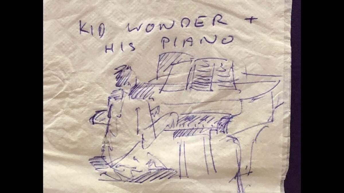 A traveler at Charlotte-Douglas International Airport left this drawing for young pianist Evan Brezicki, who plays at the airport every weekend.