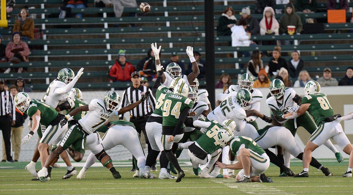 Charlotte kicker, #94, Kyle Cunanan, kicks a field goal with two seconds on the clock to bring the 49ers within a point 14-13 to end the half. Following a win last week against Florida Atlantic under interim coach, Tim Brewster, the Charlotte 49ers football team wrapped up their season on Senior Day at home against the UAB Blazers on Saturday, Nov. 30, 2024. Charlotte trailed UAB 14-13
