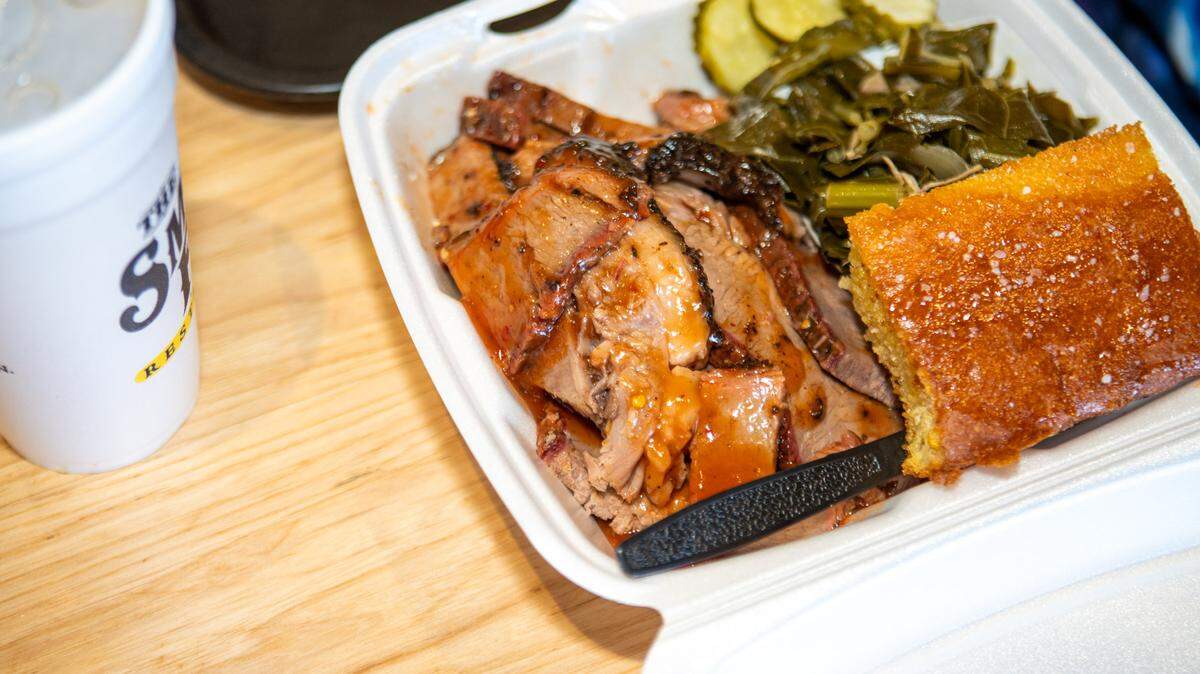 A takeout brisket plate with collards and cornbread at The Smoke Pit in Concord, which is a top option for barbecue delivery, DoorDash says.