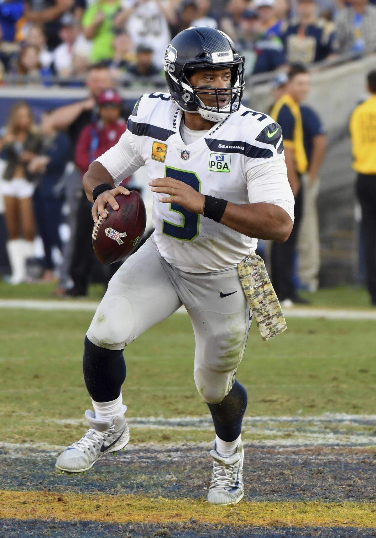 Seattle Seahawks quarterback Russell Wilson (3) presents particular problems when he scrambles because of his ability to run but his penchant for passing against an out-of-position defense.