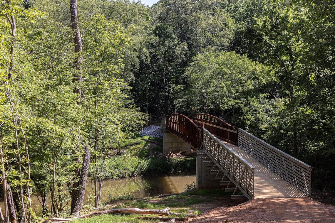 This steel and wood bridge divides the southern and northern mountain biking trails at Mountain Creek Park in Sherrills Ford, N.C., on Thursday, June 9, 2022.