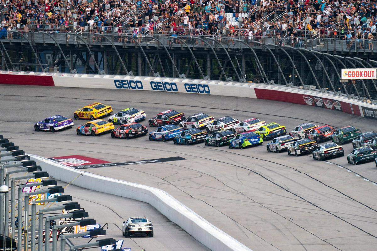 Drivers compete at the start of the NASCAR Southern 500 auto race, Sunday, Sept. 4, 2022, in Darlington, S.C. (AP Photo/Sean Rayford)