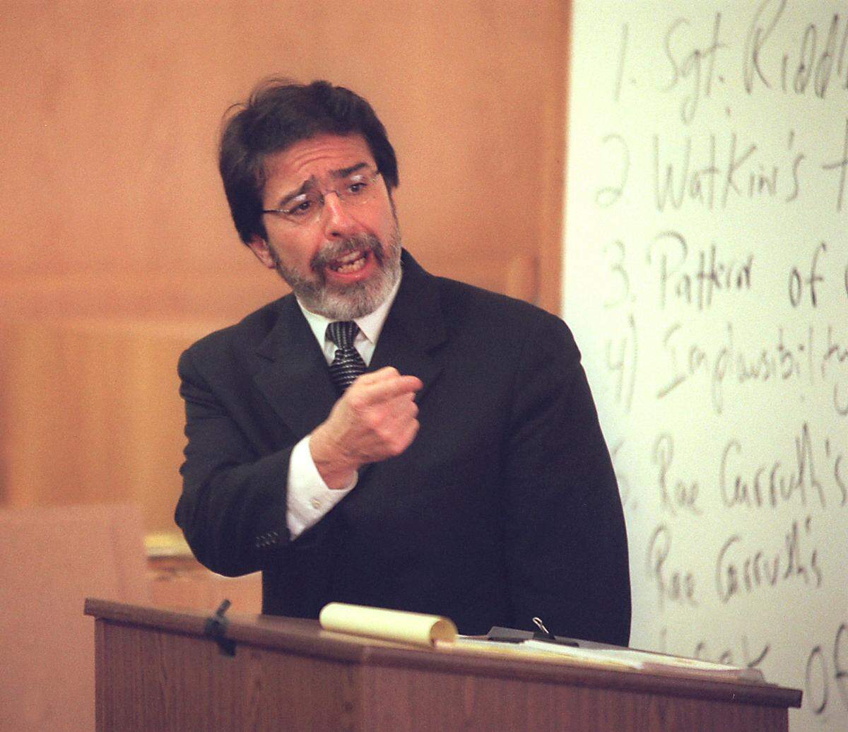 Defense attorney David Rudolf presents his closing argument in defendant Rae Carruth’s capital murder trial on Jan. 15, 2001. Rudolf argued that Carruth backed out of a drug deal he’d agreed to finance for Van Brett Watkins, and that Watkins had then shot Carruth’s pregnant girlfriend Cherica Adams in violent retribution.