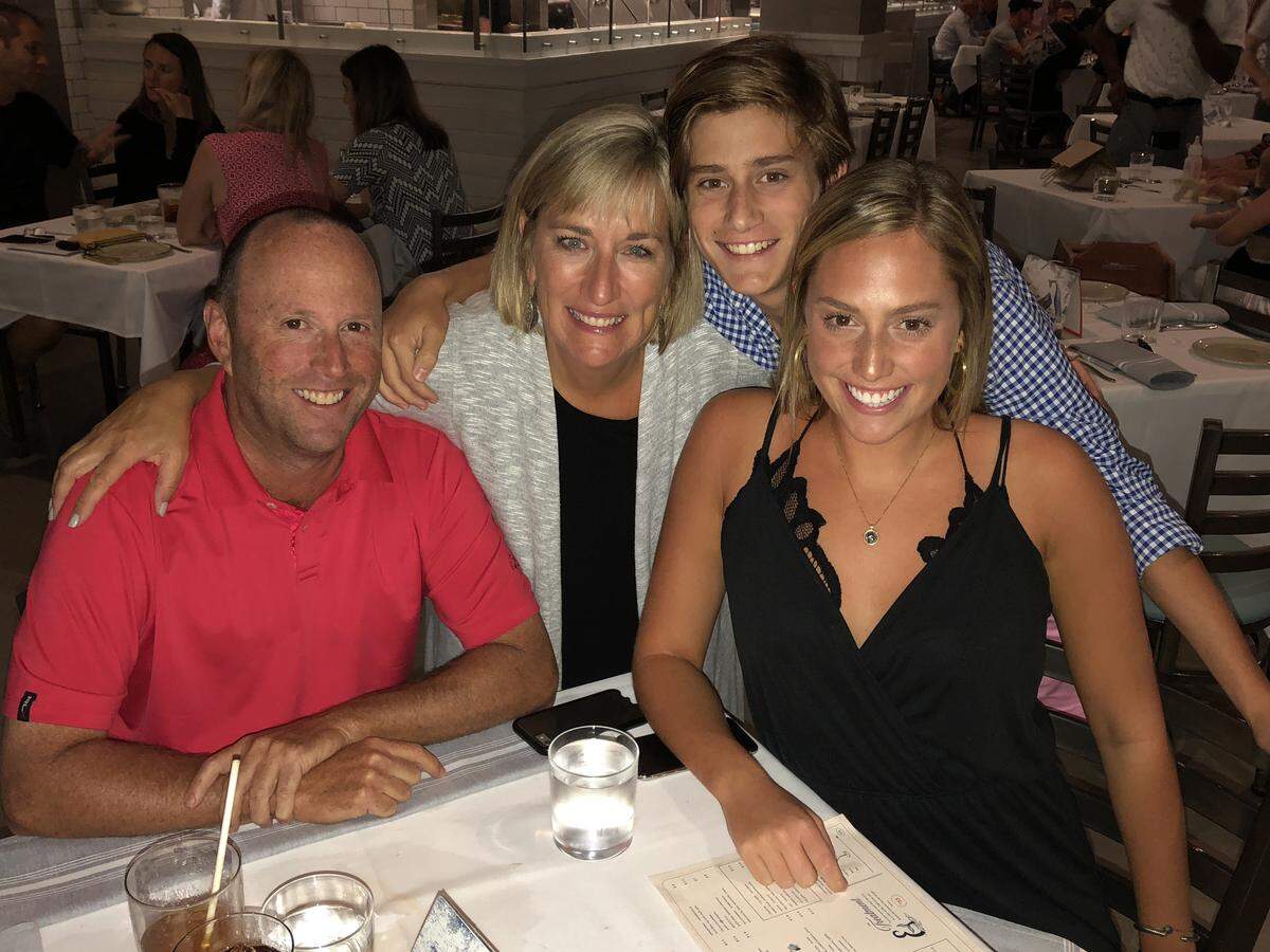 Jon Dressler, owner of Rare Roots Hospitality Group, with his family.
