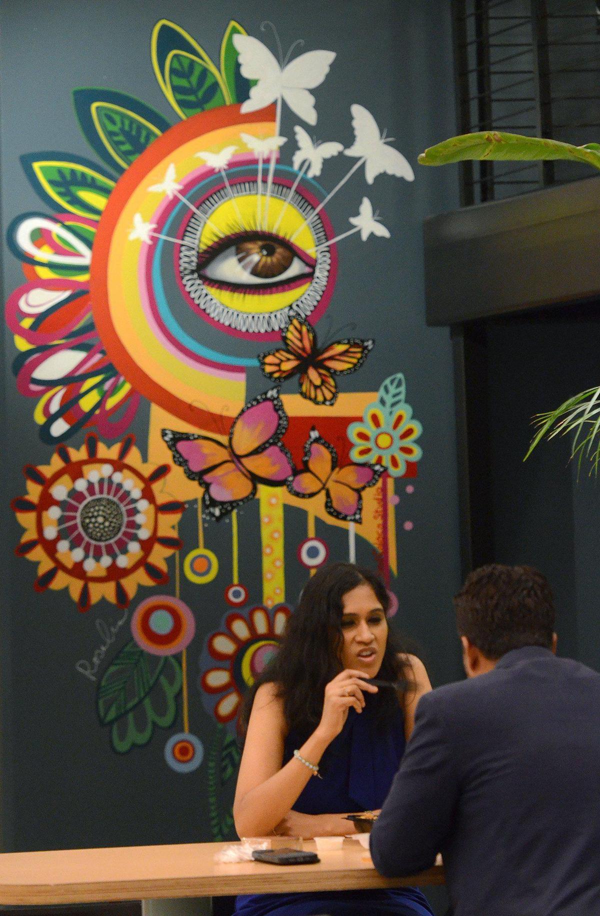 There is sit-down dining at the Monarch Market in the One Independence Center featuring artwork by Rosalia Torres Weiner of Red Calaca Studio.