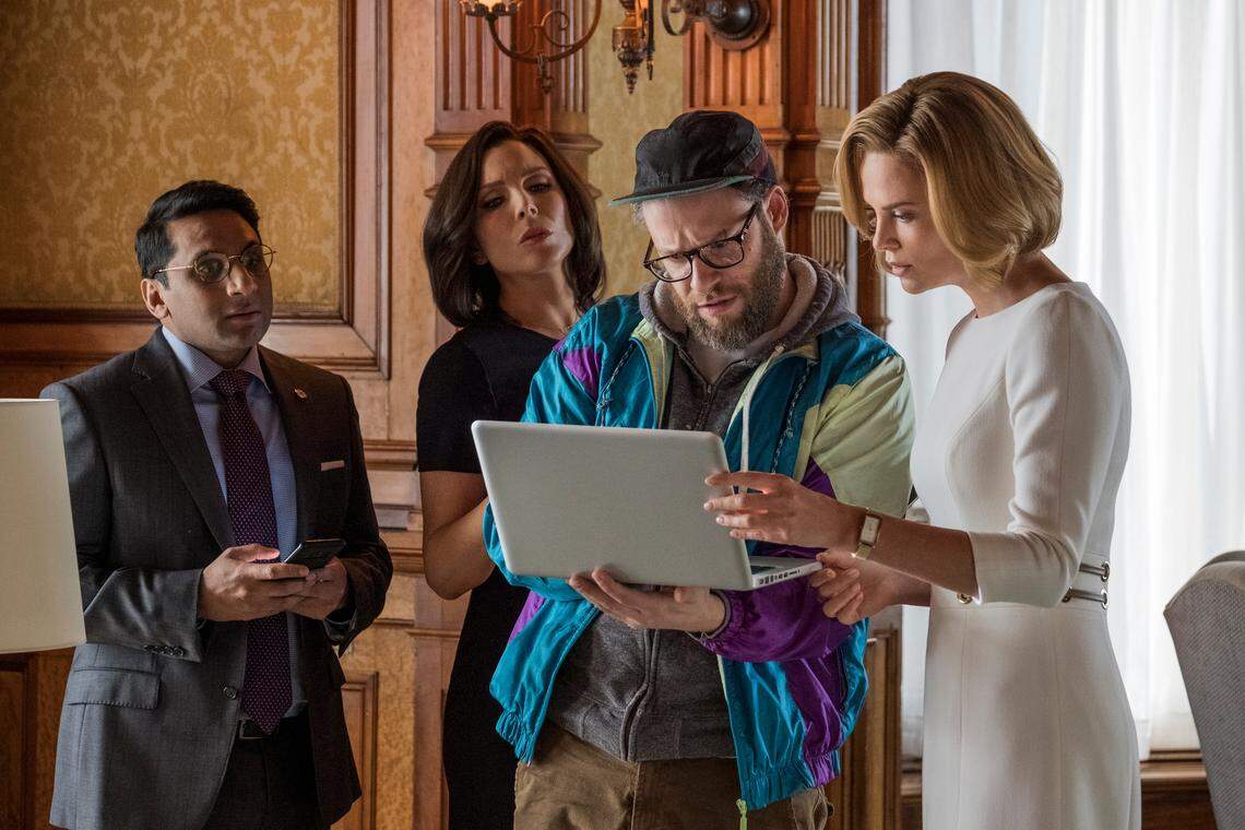Ravi Patel (far left) plays a key advisor to Charlize Theron in Long Shot, a romantic comedy that features Theron and Seth Rogen. Patel is pictured here in a scene with June Diane Raphael, Rogen, and Theron (left to right).