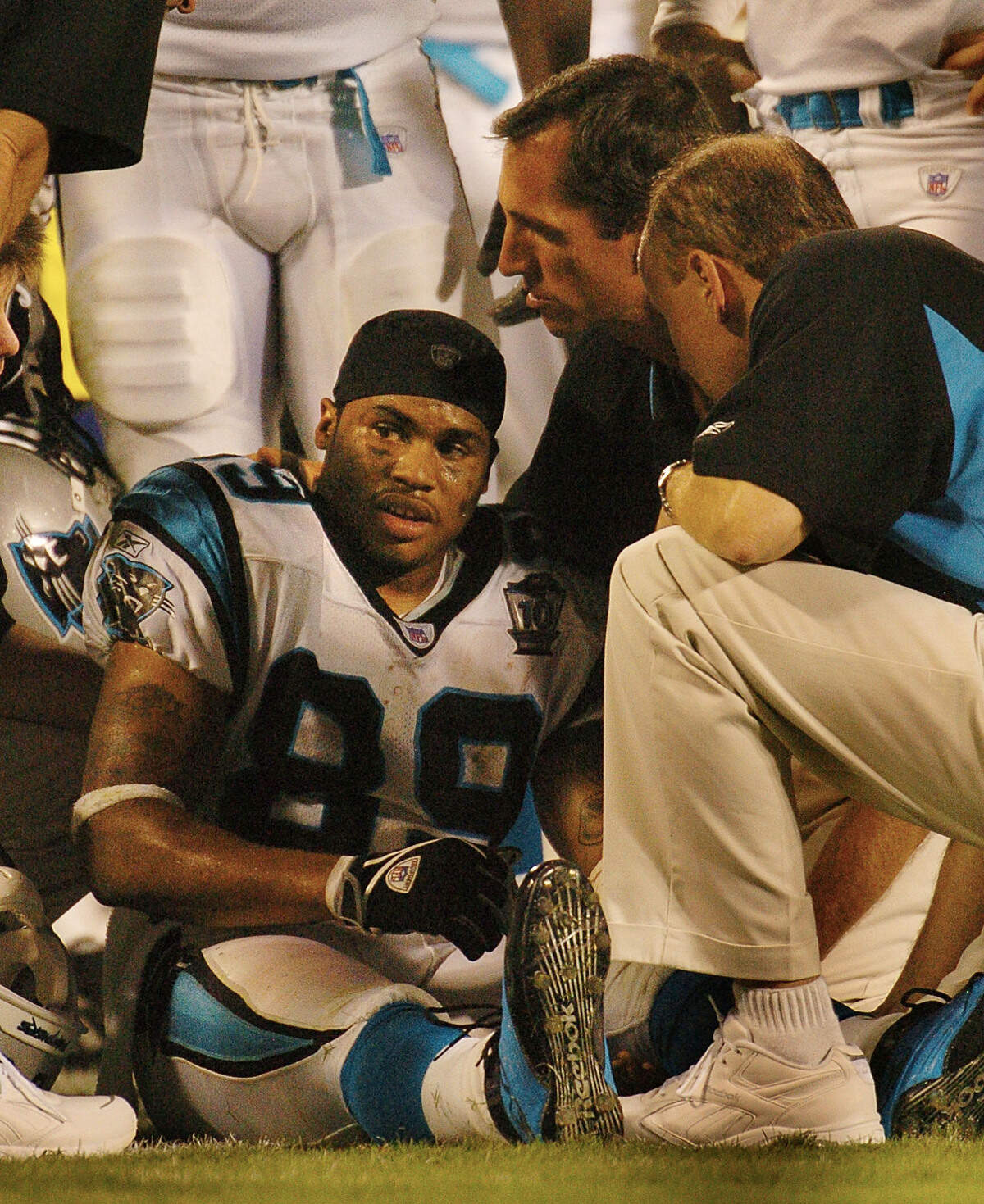Carolina Panthers wide receiver Steve Smith is tended to by the team’s medical staff after being injured late in the game against the Green Bay Packers in a “Monday Night Football” game on Sept. 13, 2004, at Bank of America Stadium. The Packers won, 24-14, and Smith was diagnosed with a broken leg that kept him out the rest of the season.