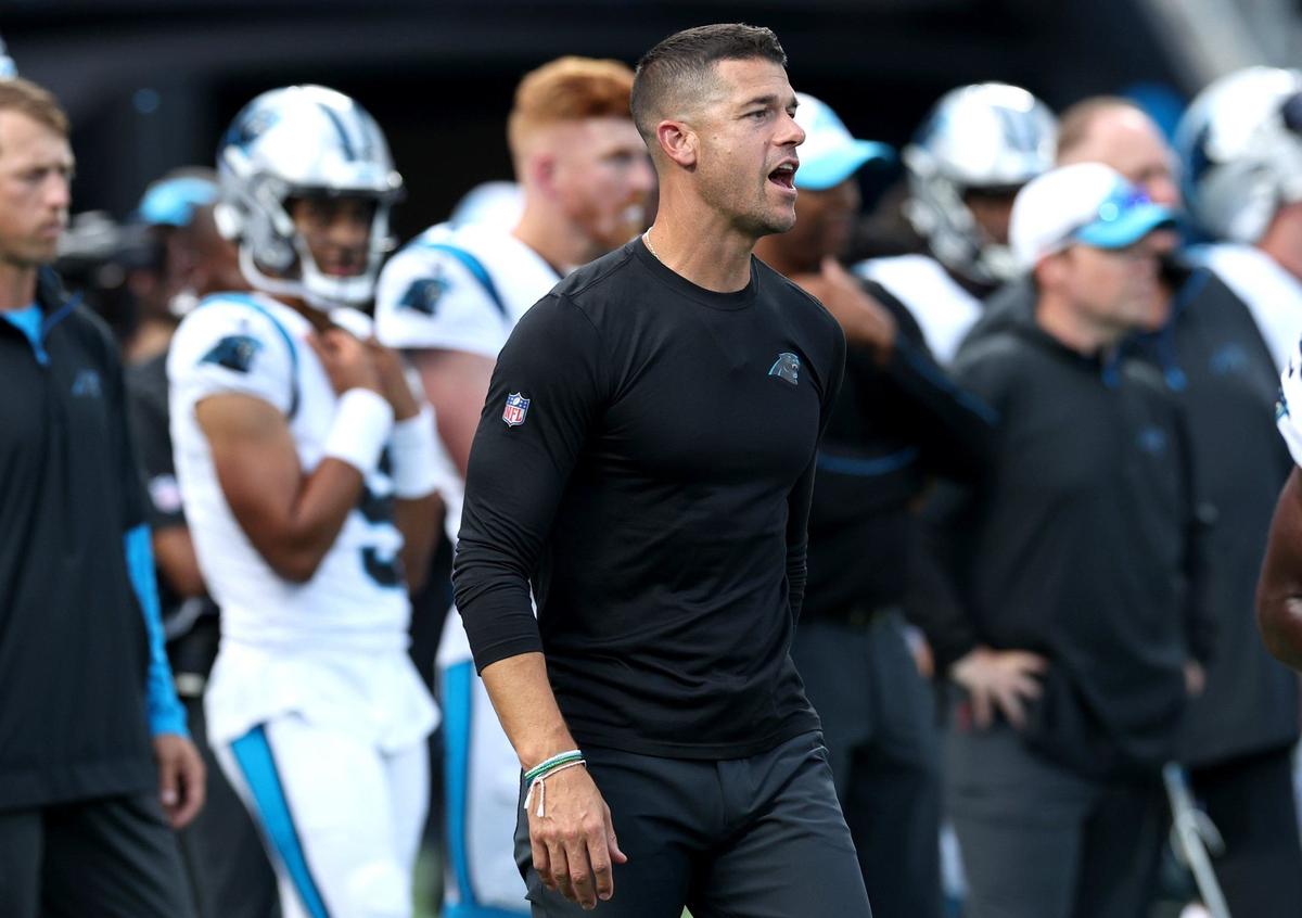 Carolina Panthers head coach Dave Canales gives instructions to his team as they run through drills prior to action against the New York Jets at Bank of America Stadium in Charlotte, NC on Saturday, August 17, 2024.