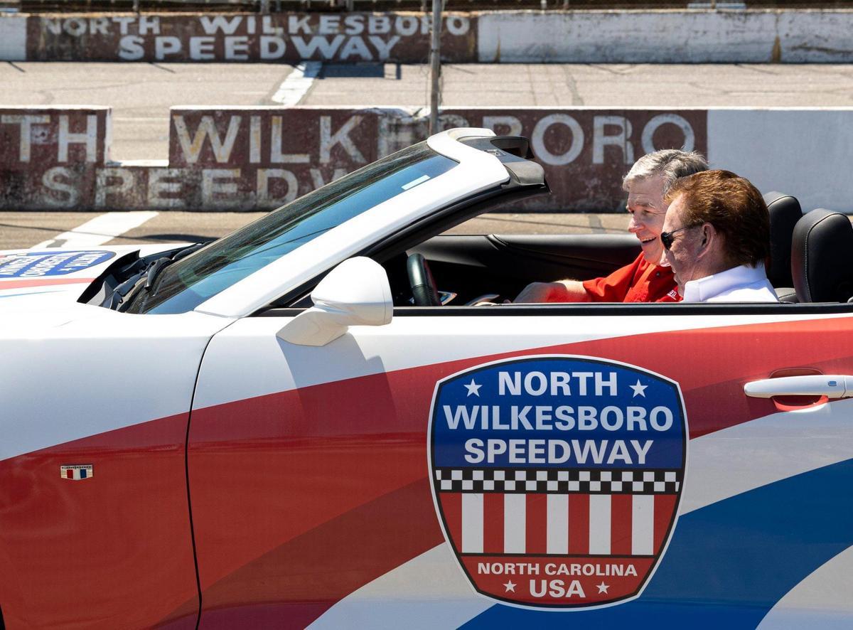 Richard Childress and N.C. Gov. Roy Cooper buckle up to take a few laps around the Historic North Wilkesboro Speedway in Wilkesboro, NC on Tuesday May 17, 2022. The speedway has not hosted a race for many years but was once common stop for early racing in the Carolinas before it evolved into NASCAR. Federal money given to North Carolina will go towards the revitalization of the speedway and will be a catalyst for other events in Wilkes county.