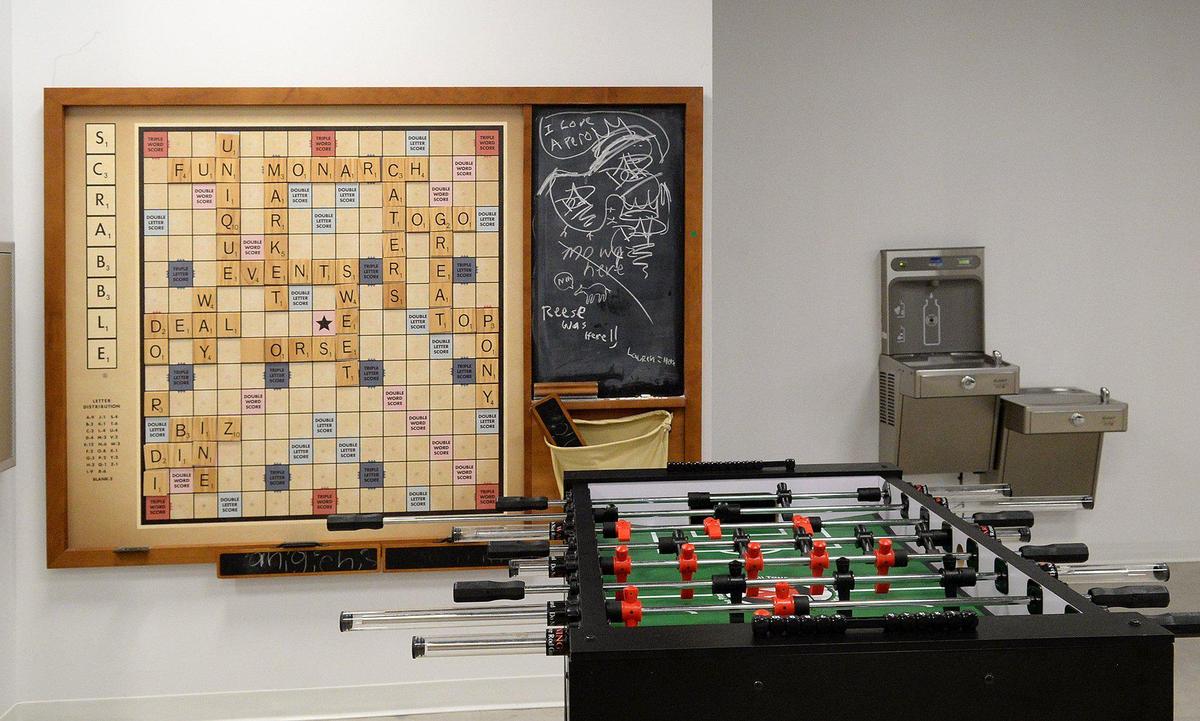 Foosball and Scrabble are two of the amenities at the One Independence Center Collaborative Lounge. The area was redesigned for tenants as a new workspace or gathering place.
