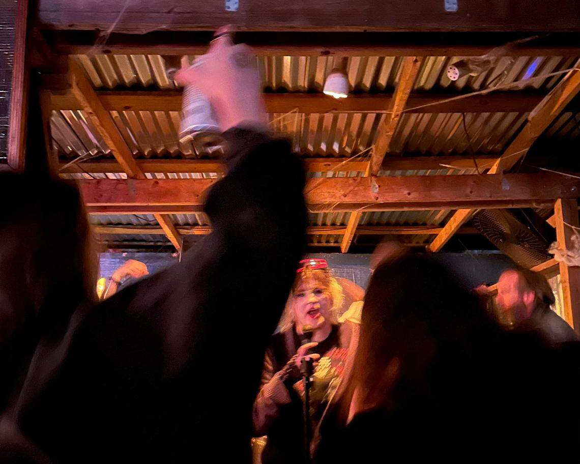 On karaoke nights, Snug Harbor always has two stages running — one inside and one outside. Choose your own adventure.