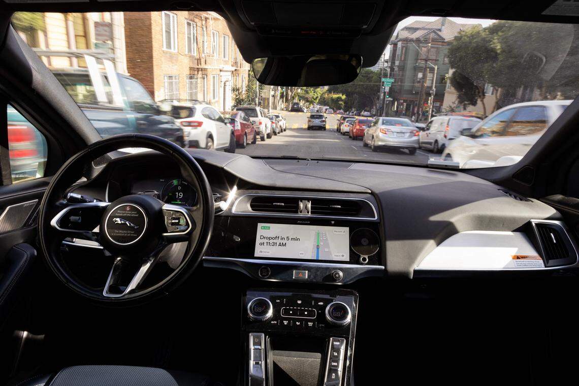 A Waymo autonomous vehicle traveling down Oak Street in San Francisco, on November 17, 2023. (Photo by Jason Henry / AFP) (Photo by JASON HENRY/AFP via Getty Images)