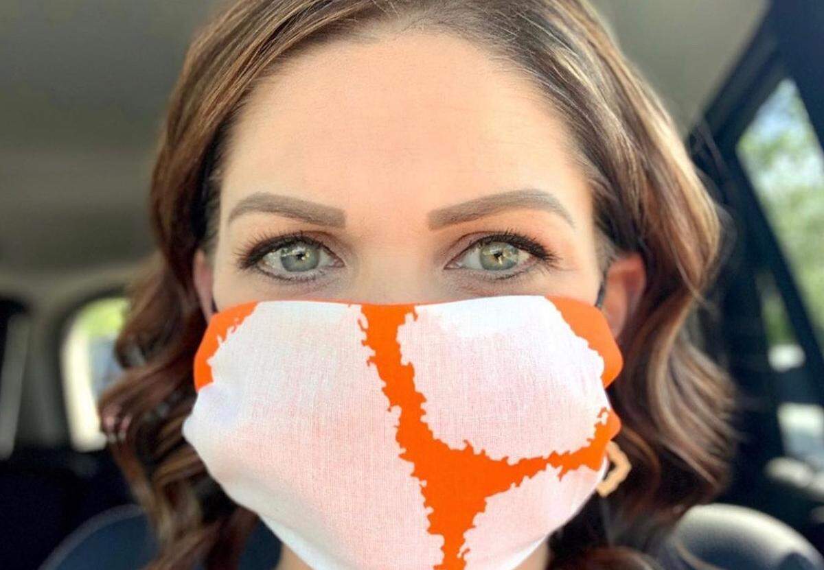 Susie Stancil created her mask from a Clemson Tiger rag using a video sent from the university alumni association.