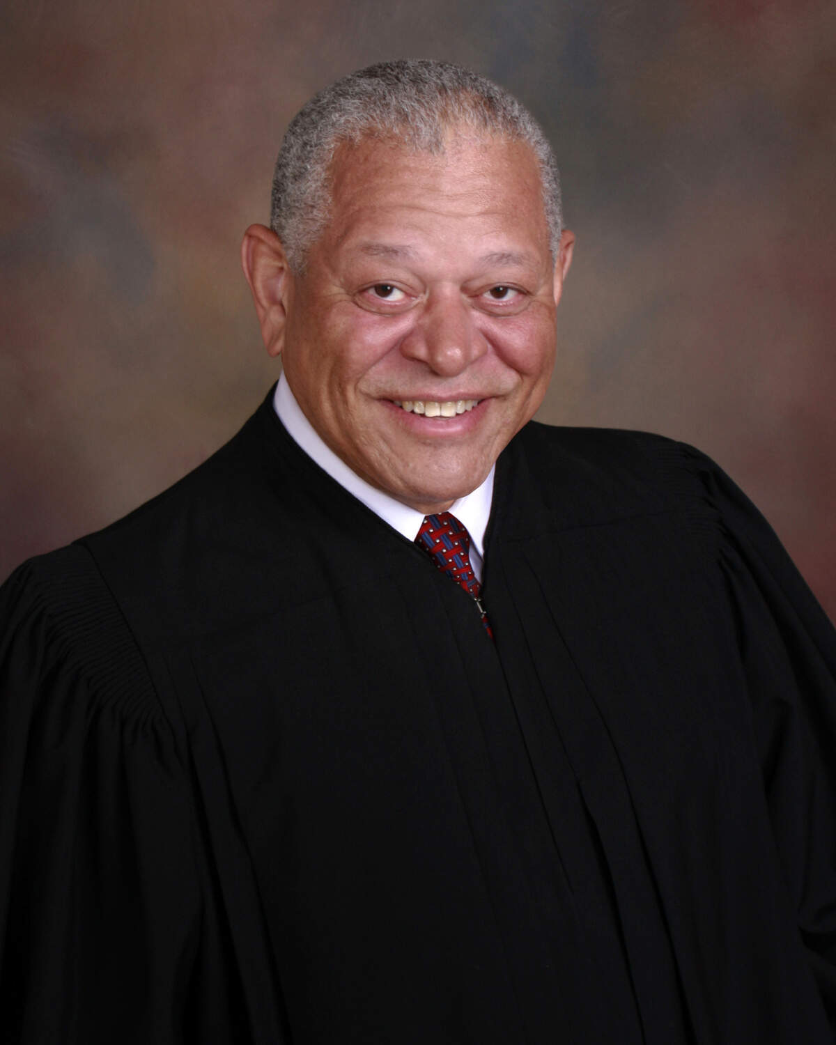 Judge Donnie Hoover's wife tested positive for COVID-19 last week. Now the veteran Mecklenburg jurist self-quarantines while he awaits the results of his own test. 