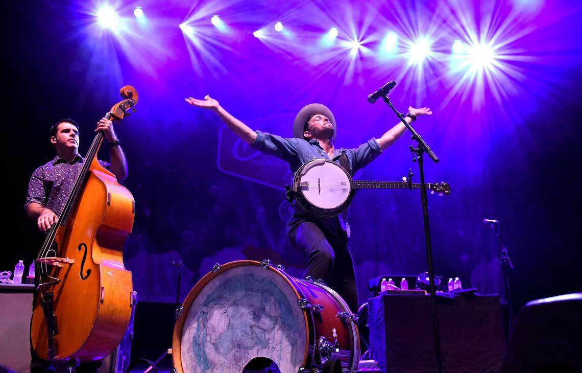 Bob Crawford, left and Scott Avett, perform in Charlotte in 2018 during an Avett Brothers concert. 
