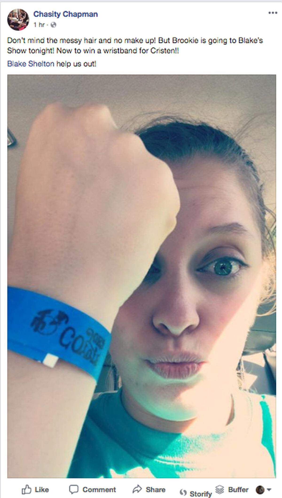 Chasity Chapman, Brooke's aunt, displays her wristband to Blake Shelton's show Wednesday.
