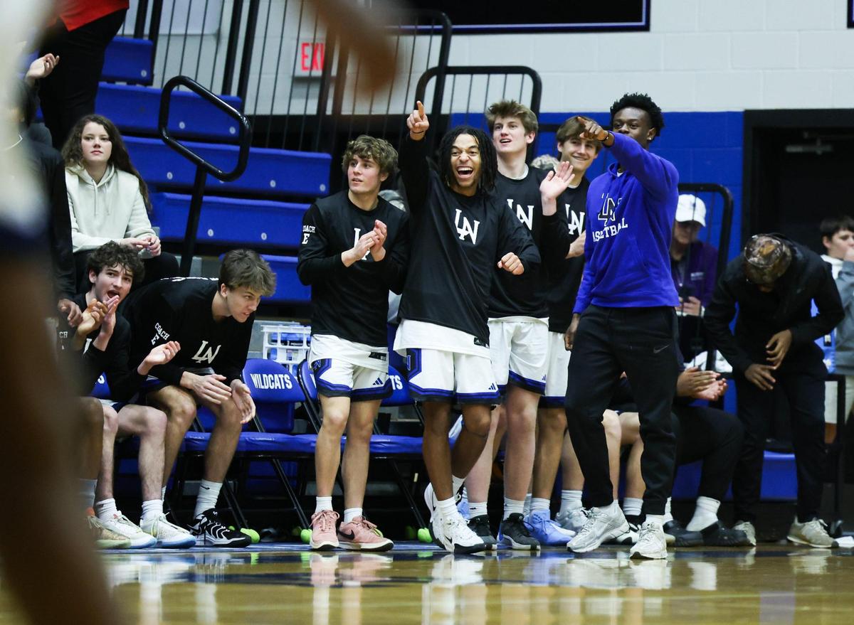 Lake Norman Wildcats bench cheers at Lake Norman High School in Mooresville, N.C., on Tuesday, January 7, 2025.