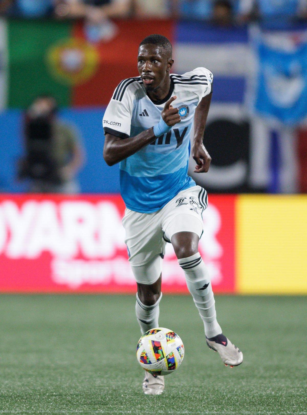 Charlotte FC midfield Djibril Diani (center) breaks up a pass in the midfield and pushes the ball down the left side of the field. Charlotte FC would host Orlando City in Game 2 of the MLS Playoffs Friday November 1, 2024.