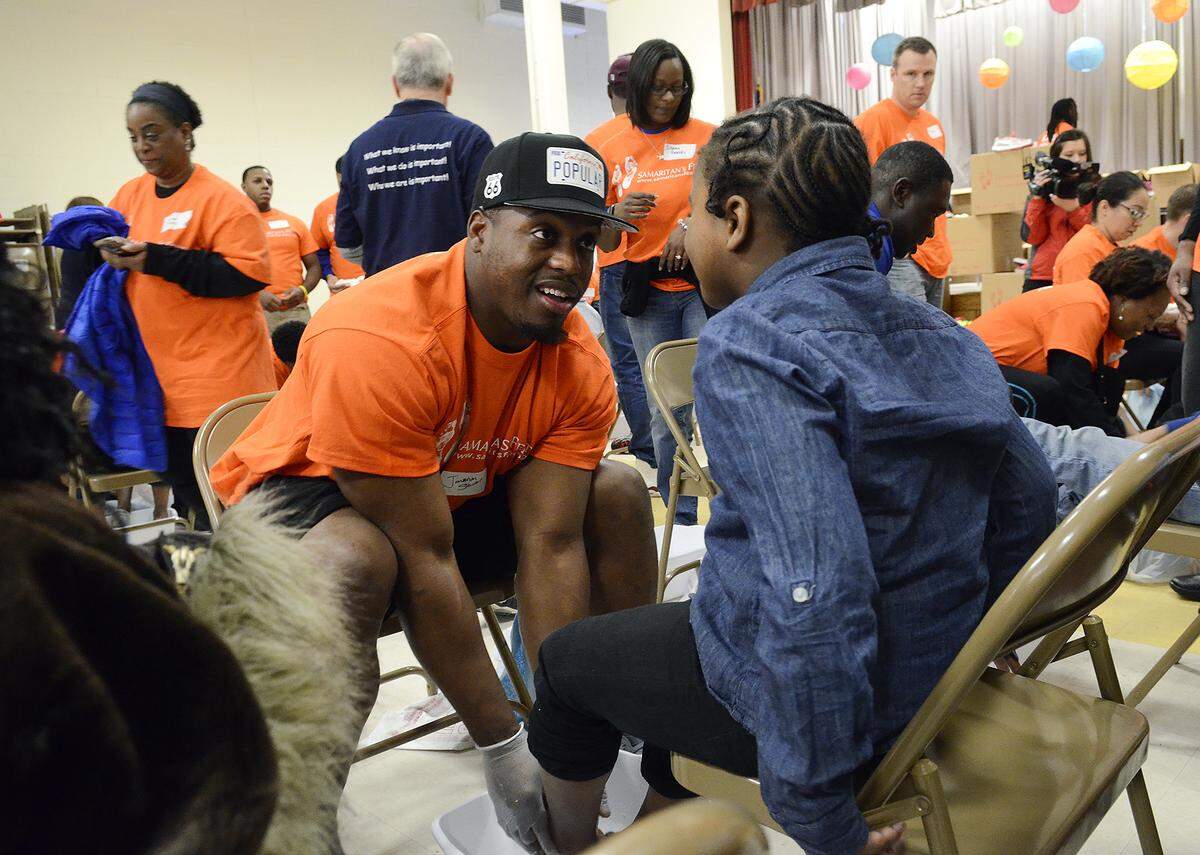 Jonathan Stewart and his wife, Natalie, were active with various charities in the Charlotte area. In 2016, Stewart helped get kids at Billingsville Elementary School get fitted for new shoes.