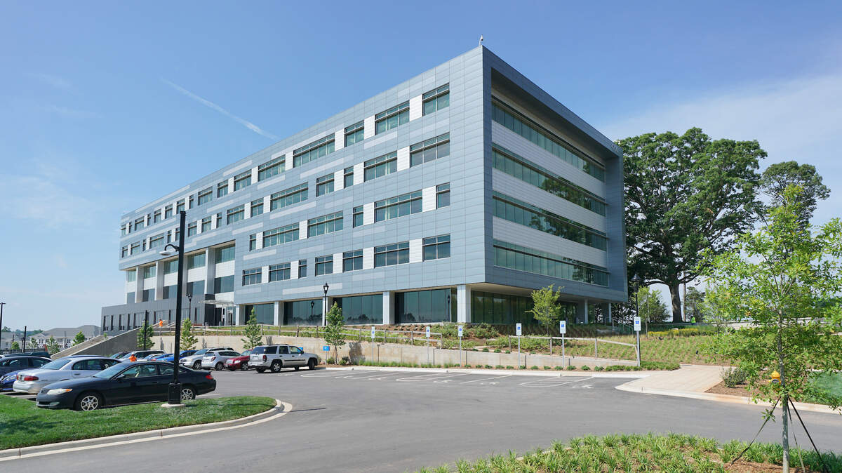 Corning Optical’s new headquarters building. The company will employ up to 650 workers in the 182,170-square-foot office building at the Riverbend Village development in northwest Charlotte.