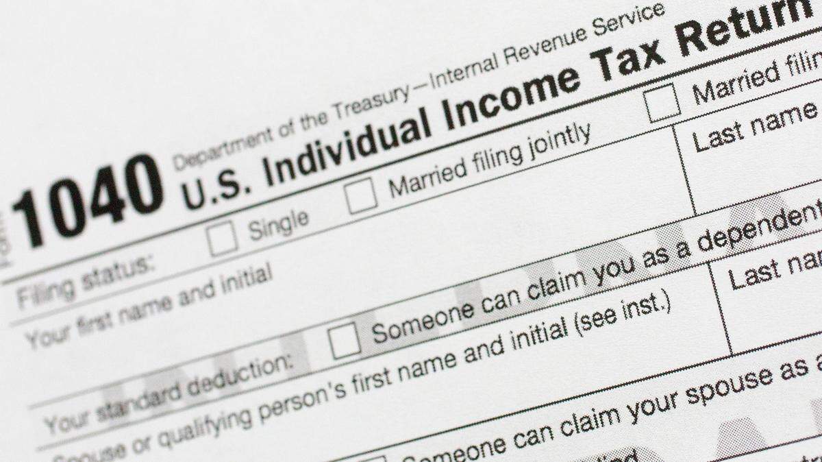 1040 U.S. Individual Income Tax Return form (AP Photo/Mark Lennihan, File)