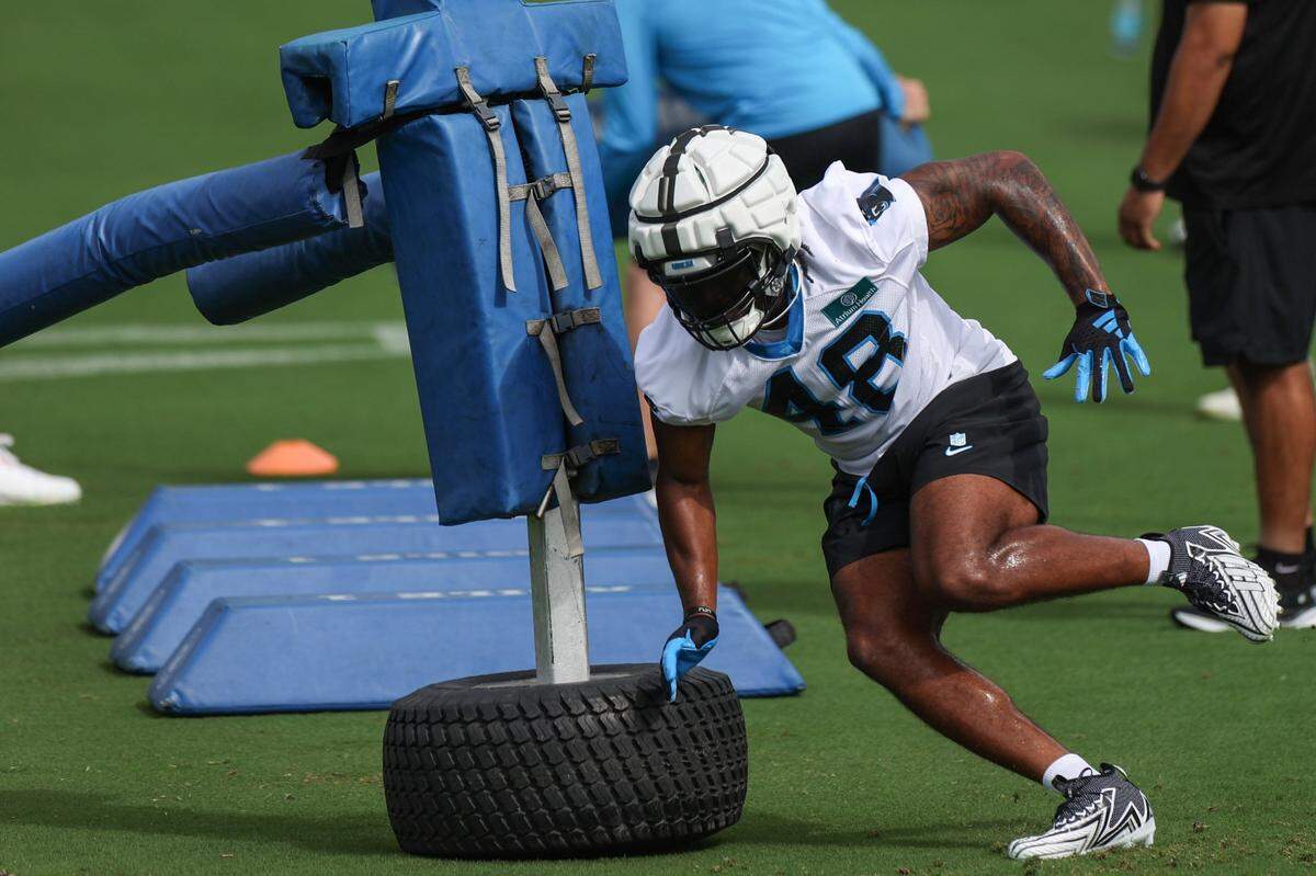 Panthers linebacker Cam Gill runs through a drill during day one of training camp practice in Charlotte, NC on Wednesday, July 24, 2024.