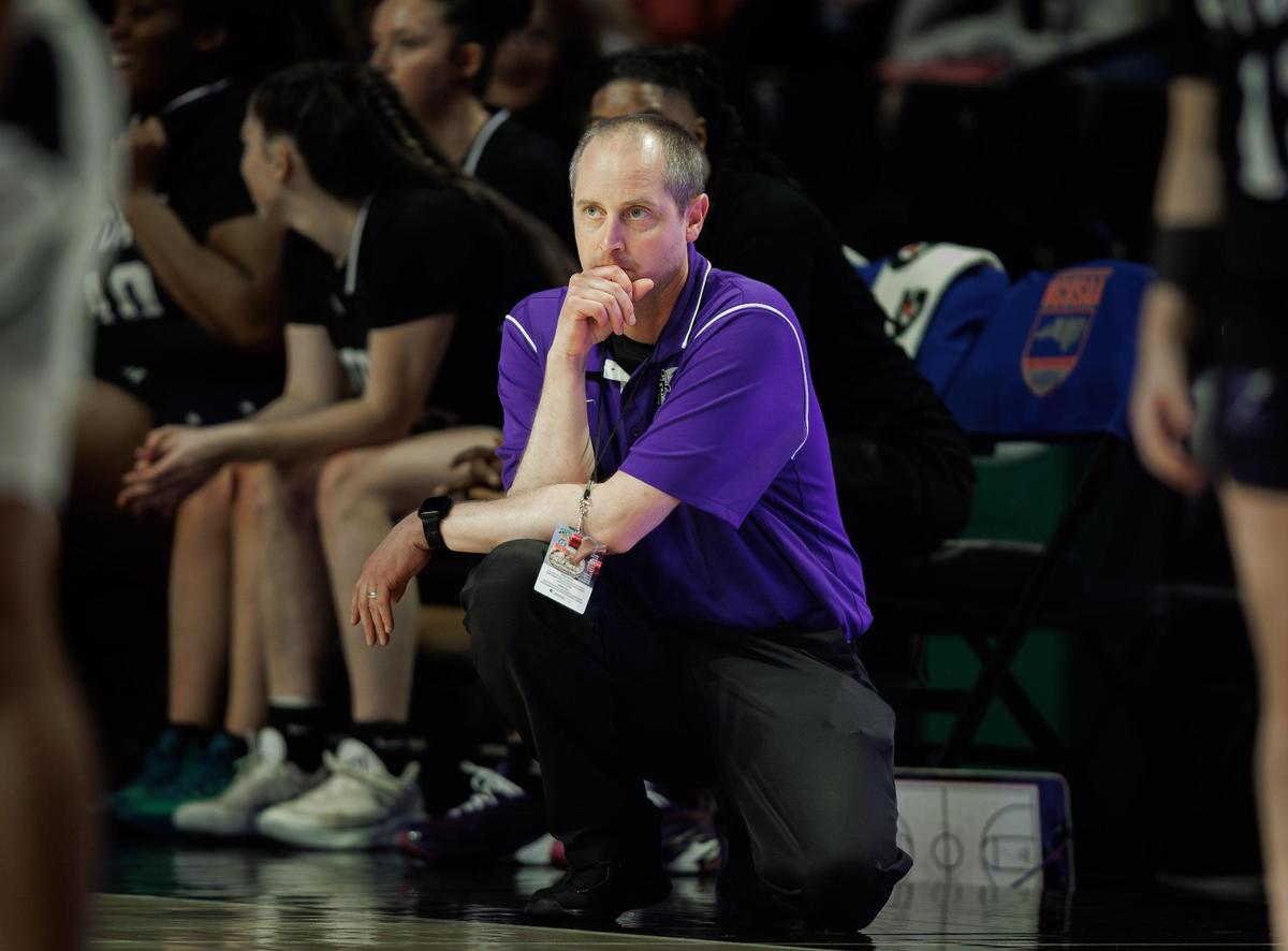Stuart Cramer head coach Carey Pohlman (center) looks on as his team would play Western Alamance in the 3A NCHSAA State Championship Friday March 14, 2025.