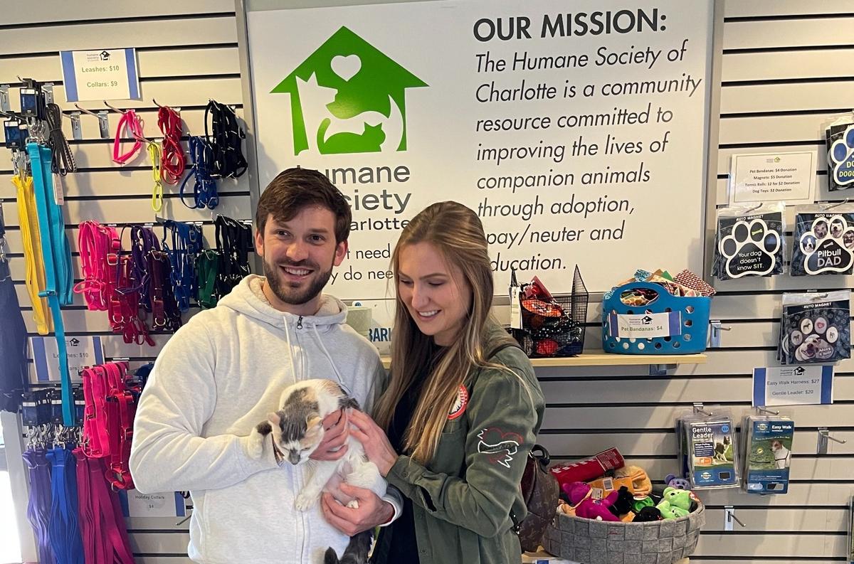 Daniel Suárez and Julia Piquet with Nicky at the Humane Society earlier this month.