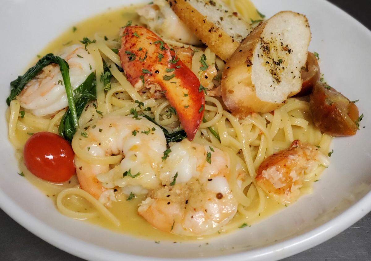 The Lobster and Shrimp Scampi, $20, is Chef Taylor Bishop’s favorite dish. It’s tossed with spinach and tomatoes in a lemon herb white wine sauce.