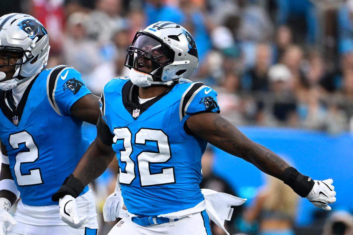 Aug 8, 2025; Charlotte, North Carolina, USA; Carolina Panthers linebacker Trevin Wallace (32) reacts in the first quarter at Bank of America Stadium. Mandatory Credit: Bob Donnan-Imagn Images