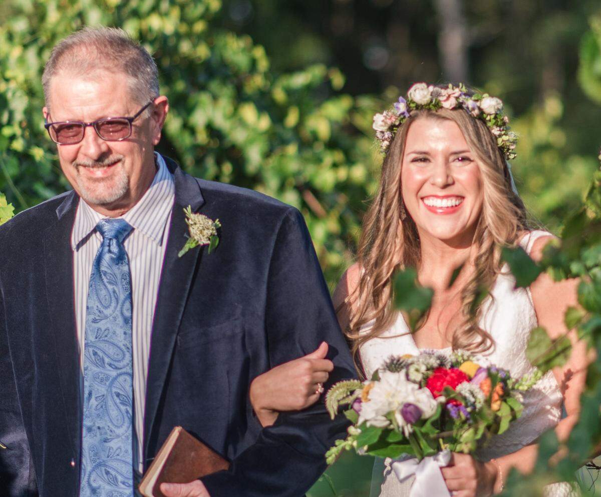 Kathryn and Logan Aggeles switched plans to host an at-home celebration to hosting a micro wedding at North Corner Haven with florals by Proper Flower.