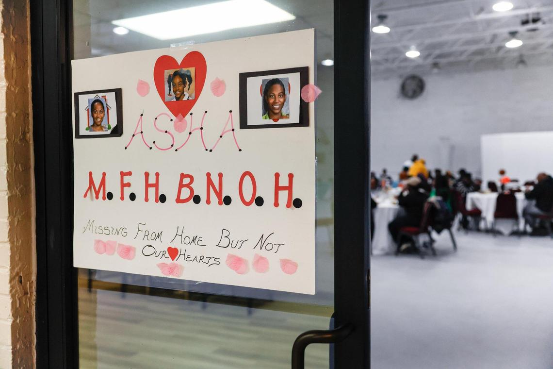 A homemade sign with photos of Asha Degree and “Missing from home but not our hearts” hangs on the door inside Macedonia Missionary Baptist Church in Waco, N.C., where the family attends church, on Saturday, Feb. 8.