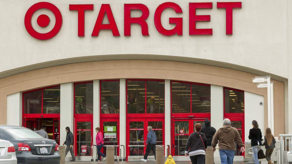 The FBI says three Charlotte-area Target stores were robbed this fall. One of the suspects in custody was a Target employee in Durham, the FBI says. (AP Photo/Damian Dovarganes, File)