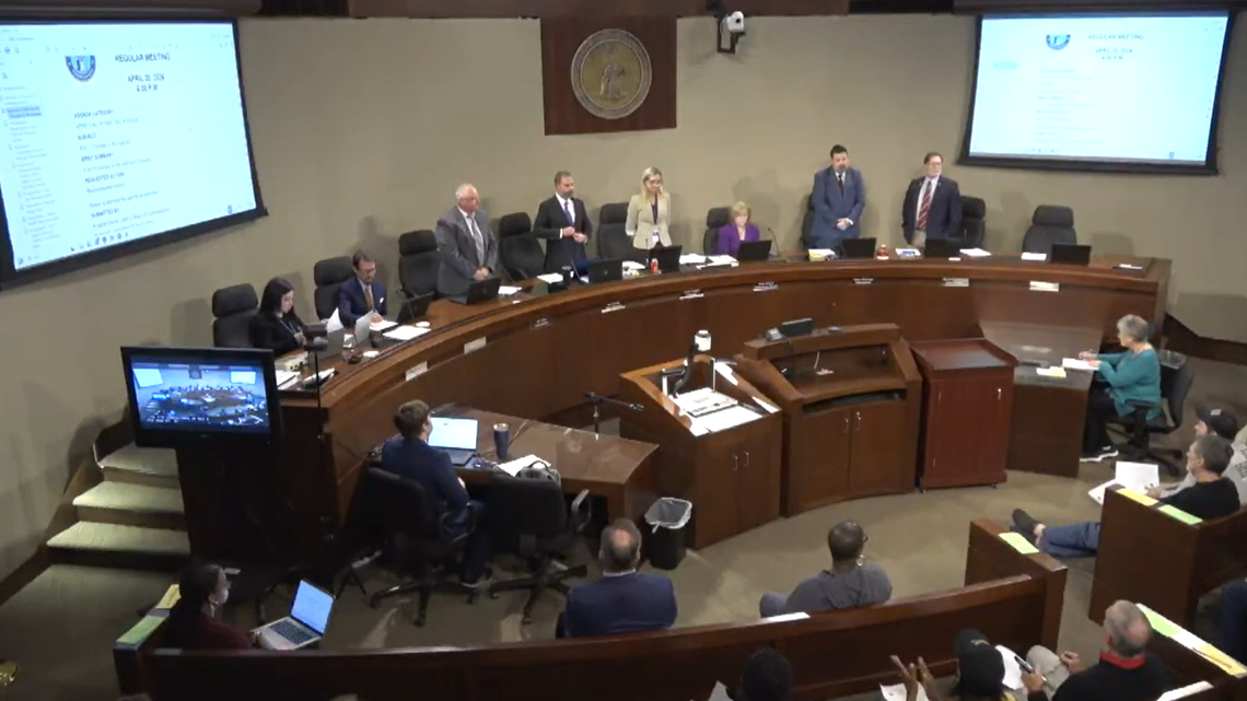 All five Cabarrus County commissioners stood Monday in a show of solidarity with parents who have urged the school board to bar transgender students from using their preferred bathrooms.