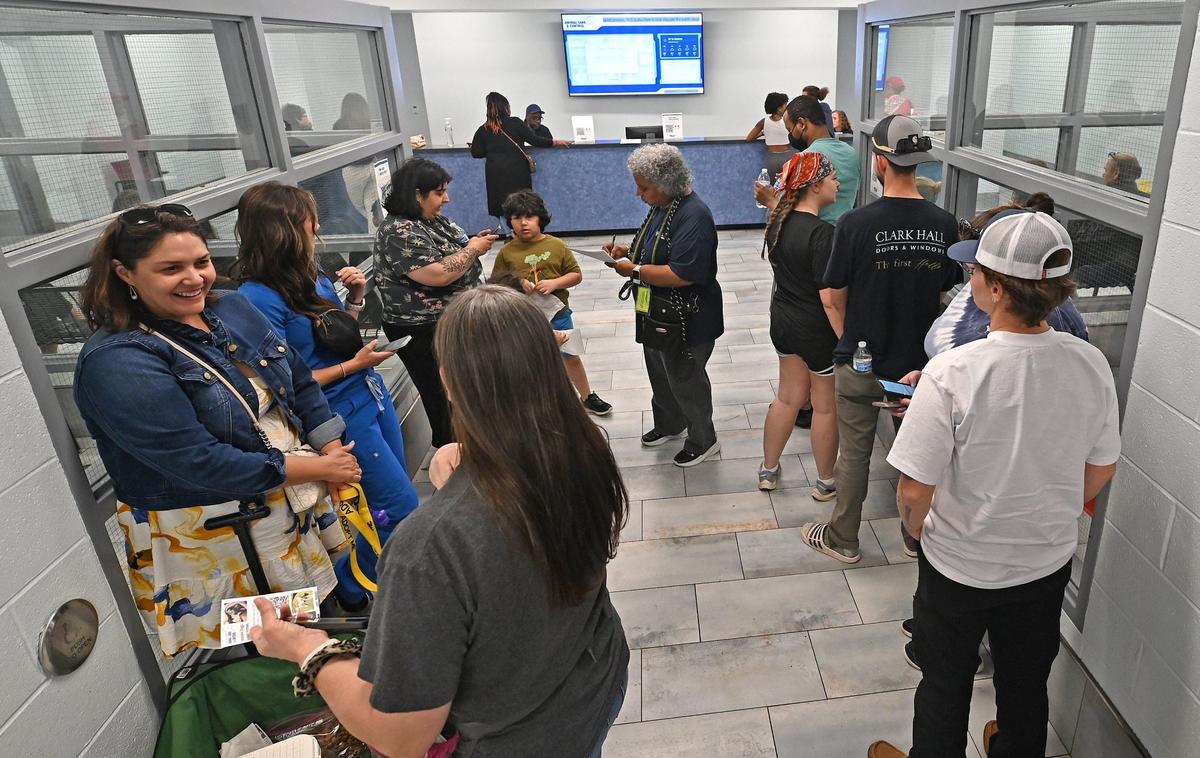 Potential foster and adoption owners line up at Charlotte-Mecklenburg Animal Care and Control on Friday, April 12, 2024. The shelter has been undergoing renovations recently and they have moved into the next phase. When completed 166 dog kennels will have been renovated.