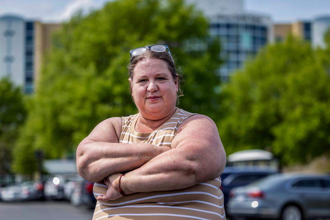 Darcy Guill, 52, of Ayden outside of ECU Health in Greenville where she receives healthcare through North Carolina’s medicaid expansion. If Medicaid cuts are made, she says it would drastically impact her quality of life.