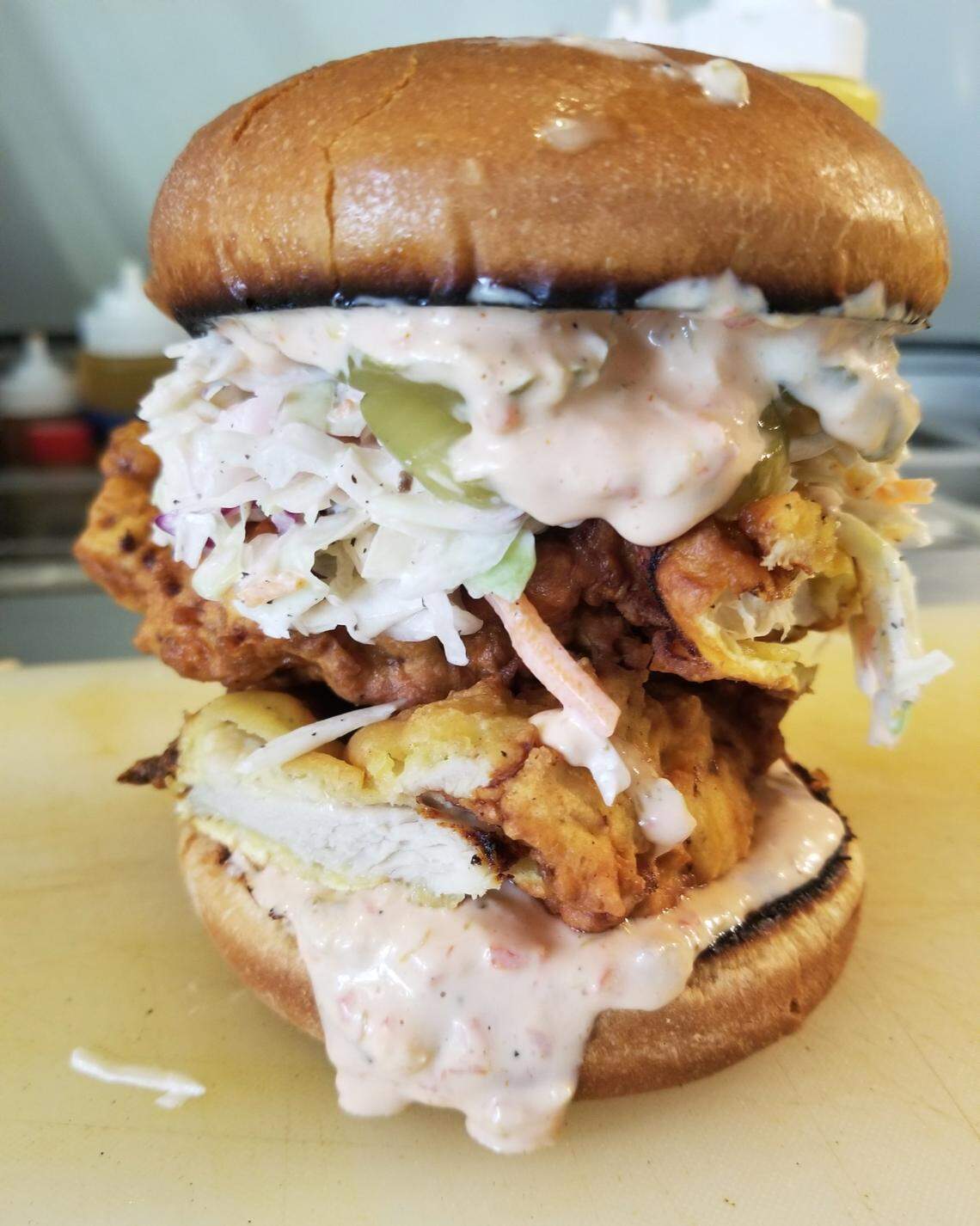 The Good Wurst Co., serving breakfast, lunch and dinner with a menu of German and New York fare like spicy chicken schnitzel sandwich (shown), will open its second Charlotte location at Vantage South End.