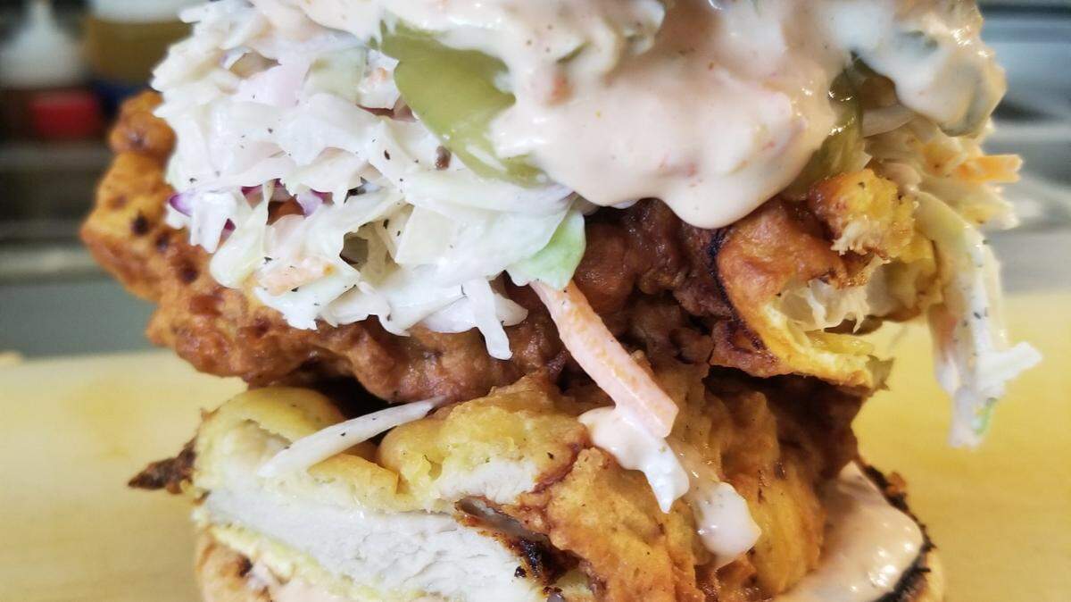 The Good Wurst Co., serving breakfast, lunch and dinner with a menu of German and New York fare like spicy chicken schnitzel sandwich (shown), will open its second Charlotte location at Vantage South End.