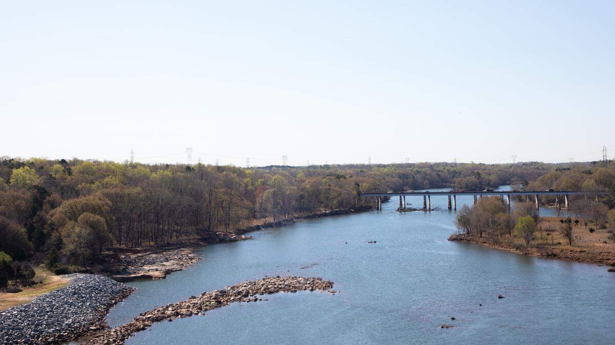 Lake Norman and the Catawba River are sources of drinking water for the city of Charlotte. Pictured here is North Carolina Highway 73 (NC 73) as it makes its way into Mecklenburg County downstream of the Cowans Ford Dam between Lake Norman and Mountain Island Lake.