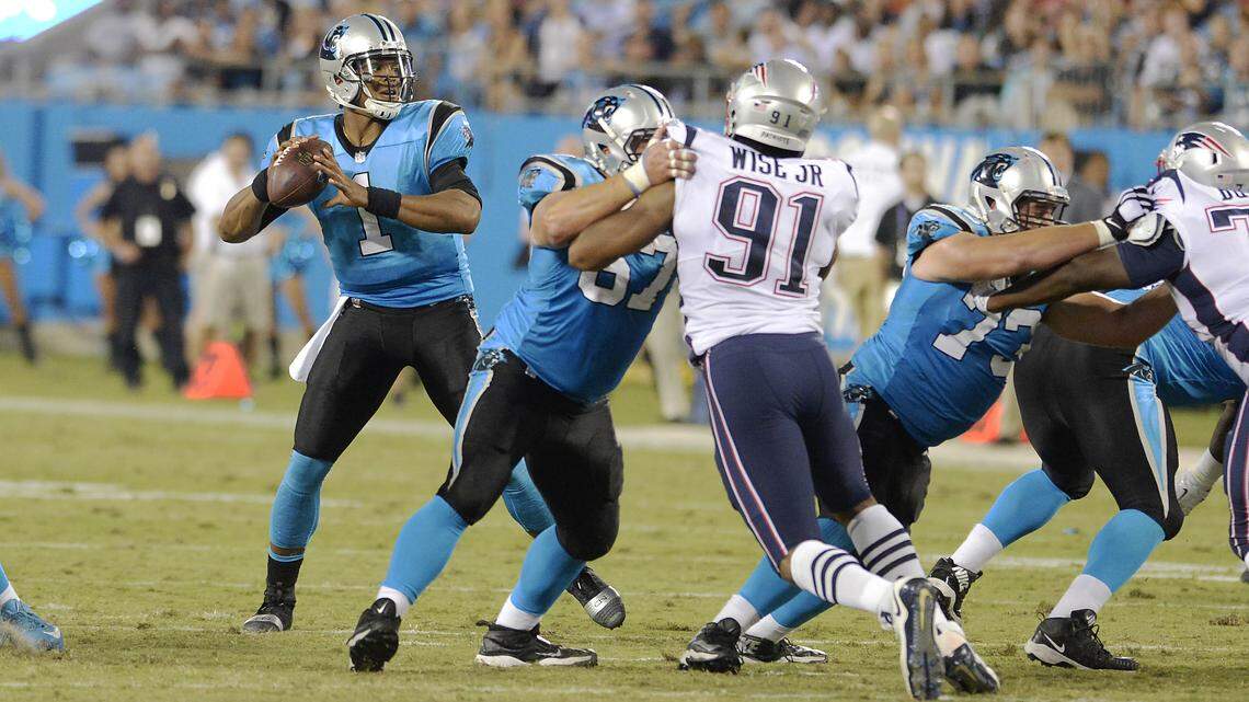 Carolina Panthers quarterback Cam Newton (1) is looking to push his completion percentage above 65 percent this season, but he’ll need time from a makeshift line to do it.