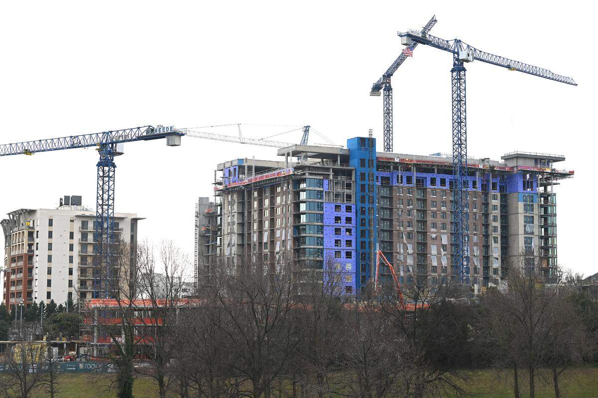 It could take weeks or months for investigators to release their findings on the deadly collapse of scaffolding at a construction site along E. Morehead Street in Charlotte, seen here on the right.