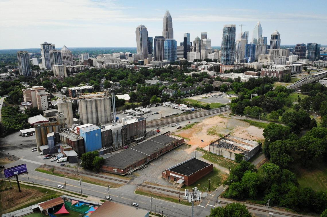A mostly vacant, 5-acre lot at the corner of West 9th and Johnson streets sits close to a large flour mill. Both are close to uptown and Interstate 277. A developer has proposed to build 82 townhomes, leading to concerns from the mill.