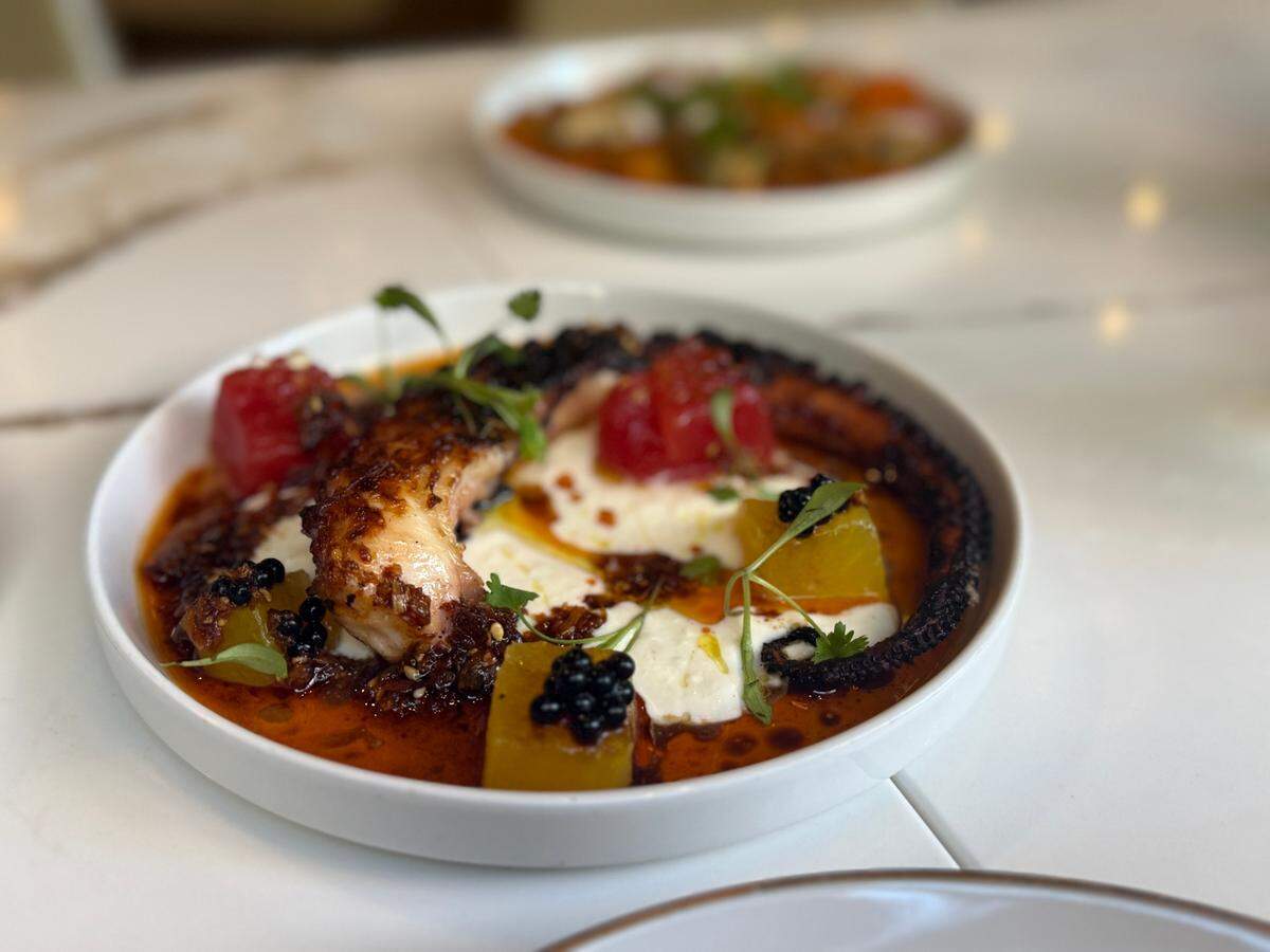The woozy textures of the grilled octopus leg and feta at Mazi make this dish stand out.