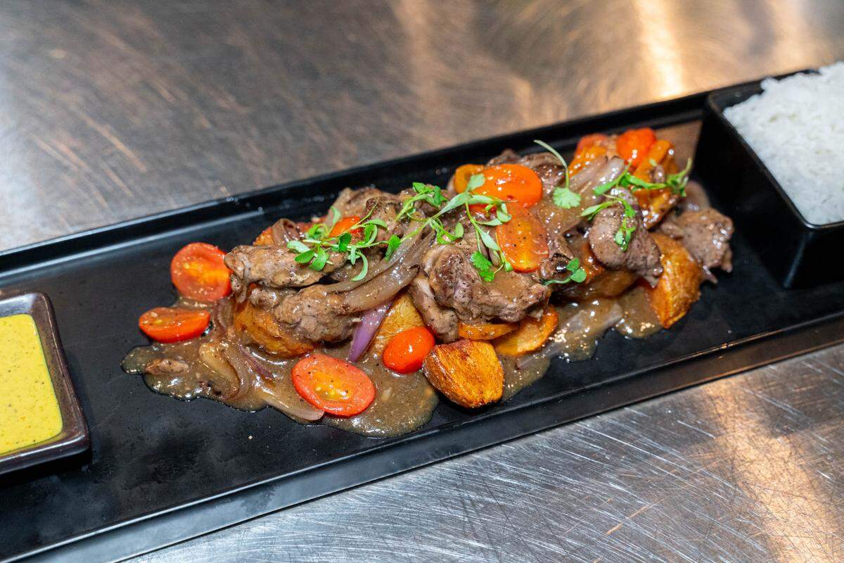 Yunta’s loma saltado is stir-fried filet mignon, andean baby potatoes, Red onion, cherry tomato, cilantro, jasmine rice.