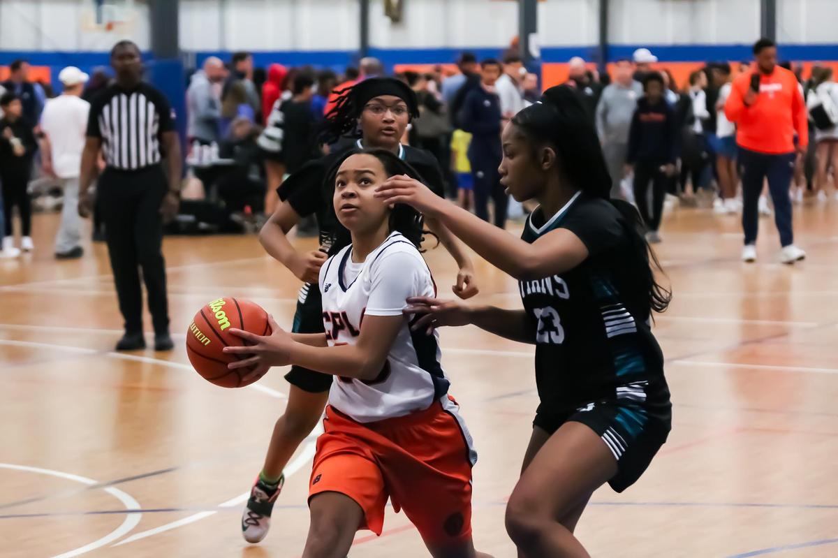 Middle school girls from over twenty one counties came out to compete in the 3rd annual Muggsy Bogues’ middle school basketball tournament at Carolina Courts in Indian Trail, NC