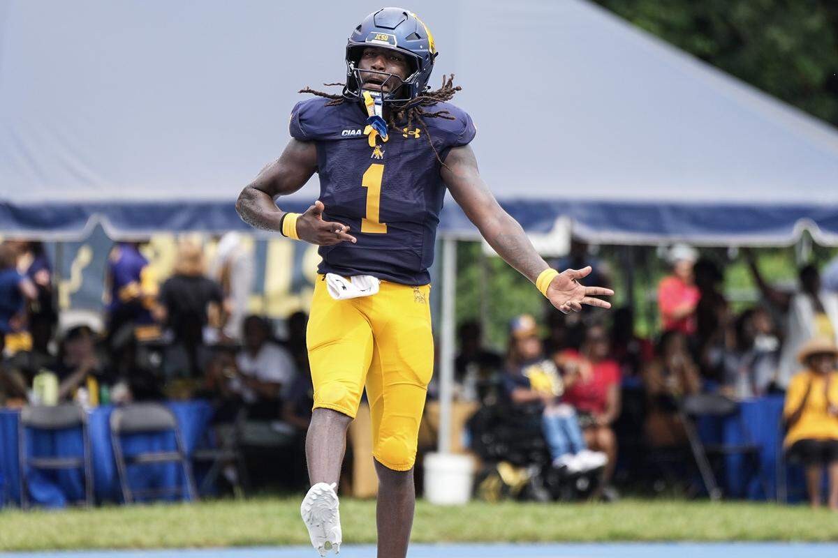 Johnson C. Smith quarterback Kelvin Durham (1) celebrates a touchdown during the second half of a CIAA football game against Valdosta State, Saturday, Sept. 6, 2025, in Charlotte, N.C.