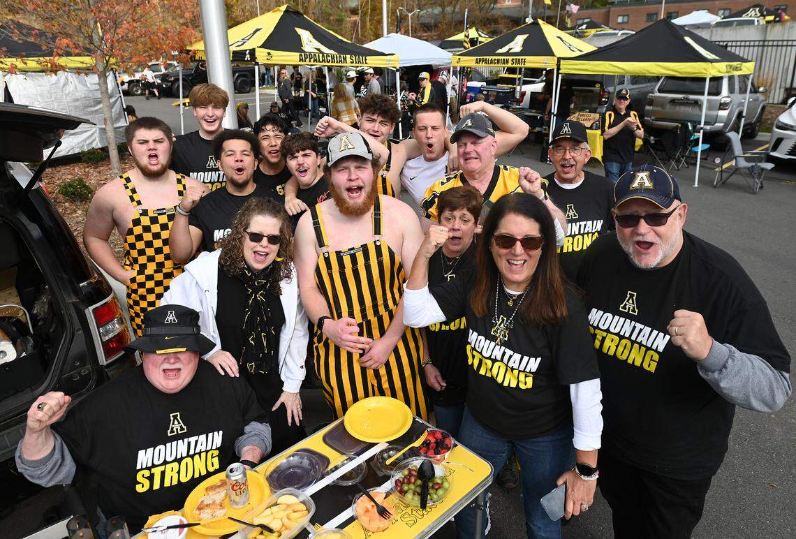 Appalachian State freshman Charlie Richards, center, was joined by family and friends for their tailgating activities outside Kidd Brewer Stadium in Boone, NC on Saturday, October 26, 2024. Appalachian State played Georgia State in the first home game since Hurricane Helene struck the area.