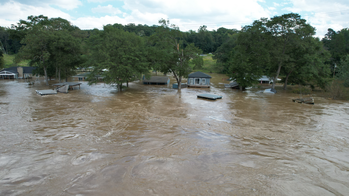 In this drone image shows homes submerged in flood water from the Catawba River near Mountain Island Lake on Sept. 28.